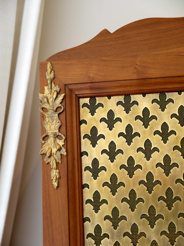 Brass panels with fleur de ly motif