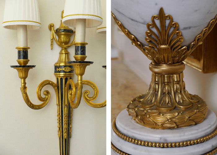 Detail of Louis style gilded vase and light fitting.