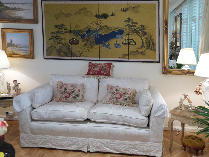 French sofa in white damask with Chinese style painting.