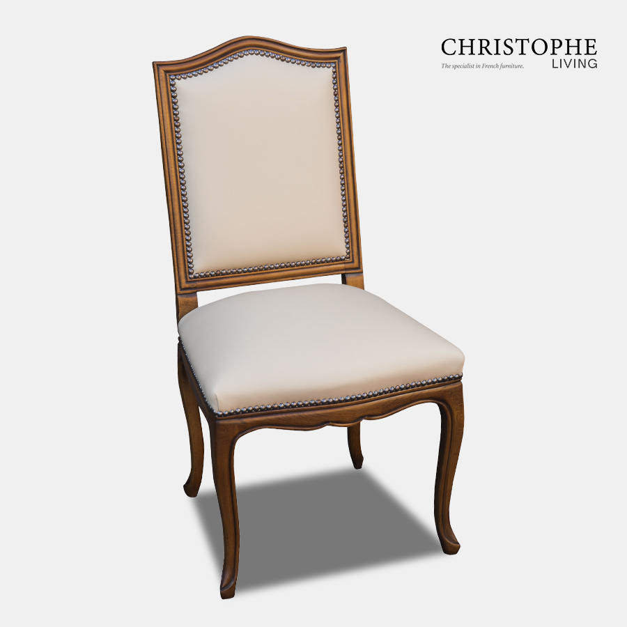 French chair for dining room with timber frame and leather upholstery and Hamptons style studding in walnut finish with curved apron