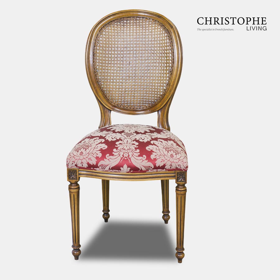 French style timber dining chair with red damask fabric and cane upholstered back with oval shape and tapered legs