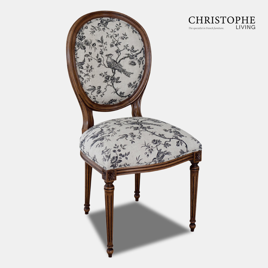 Louis XVI oval back dining chair with upholstery in grey bird toile French fabric and finish in walnut timber