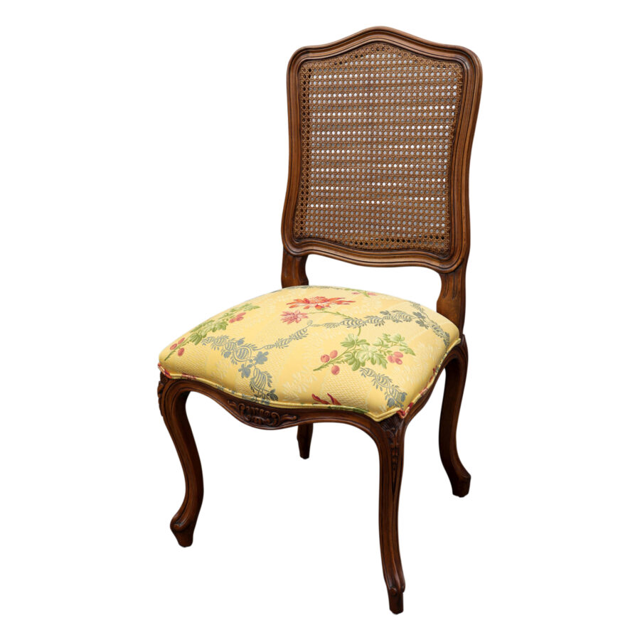 French classic Provence style dining chair with yellow brocade fabric and cane back in timber with carving