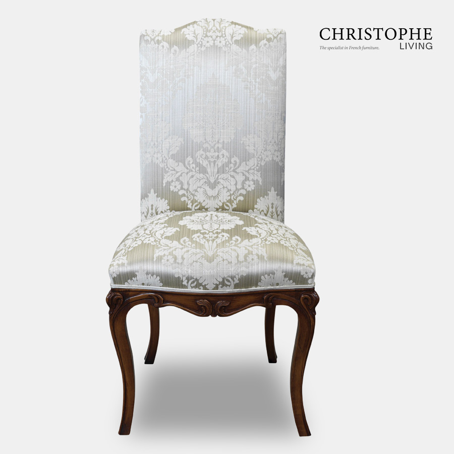 Luxurious French style dining chair fully upholstered in French blue damask with dark timber legs and ornate carvings