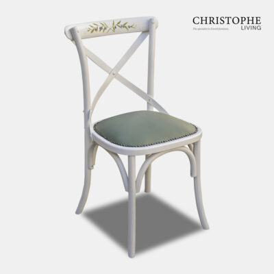 French provincial cross back white dining chair hand painted with olive leaf motif and leather seat with Hamptons style studs.