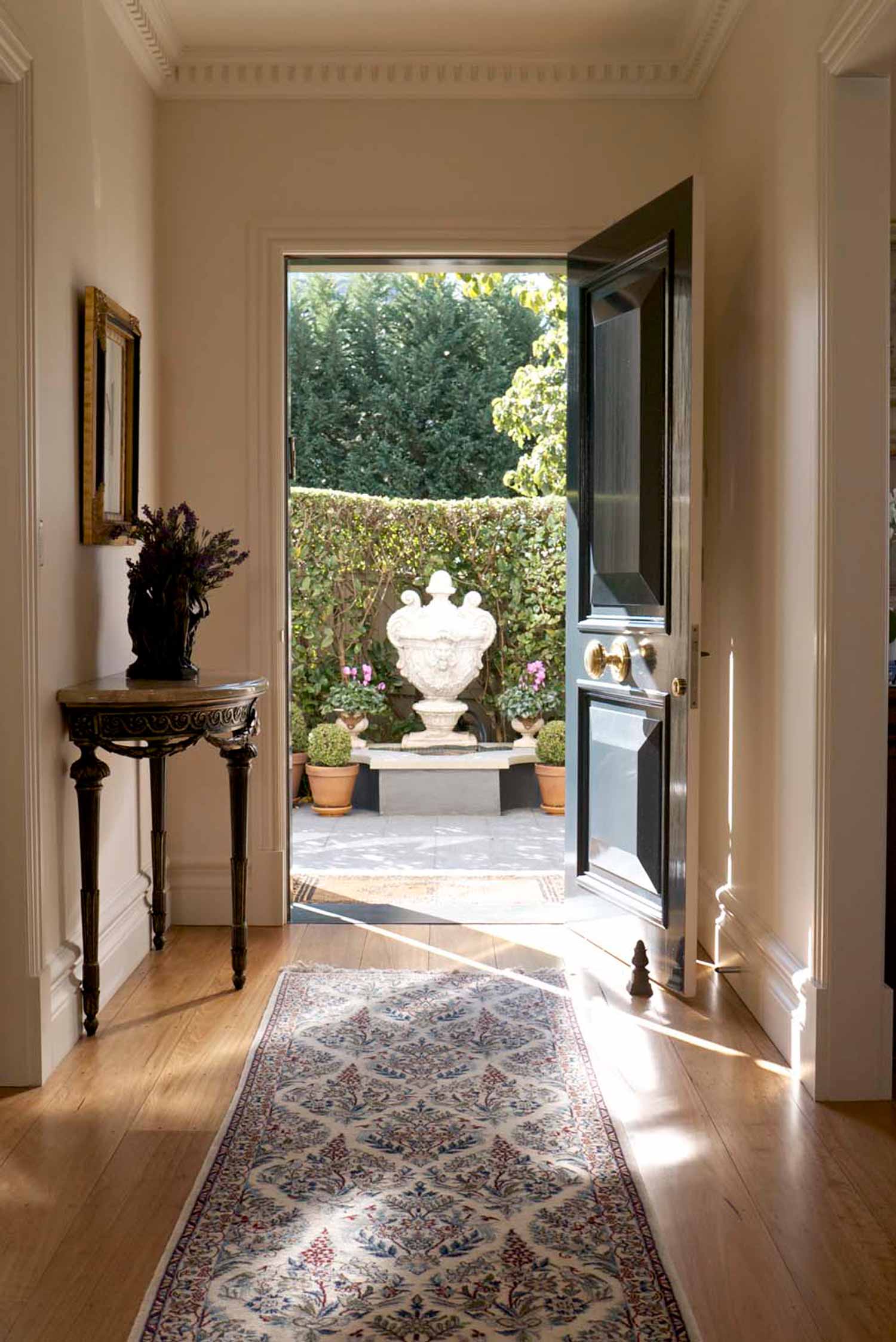 10 Entrance with french hall table and french print at front door with rug