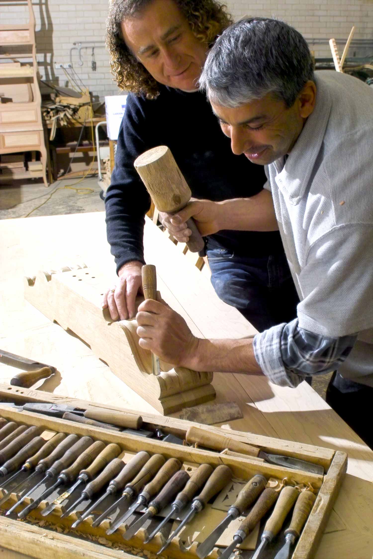 3 Jean-Christophe and a cabinet maker building a table base with chisel tools