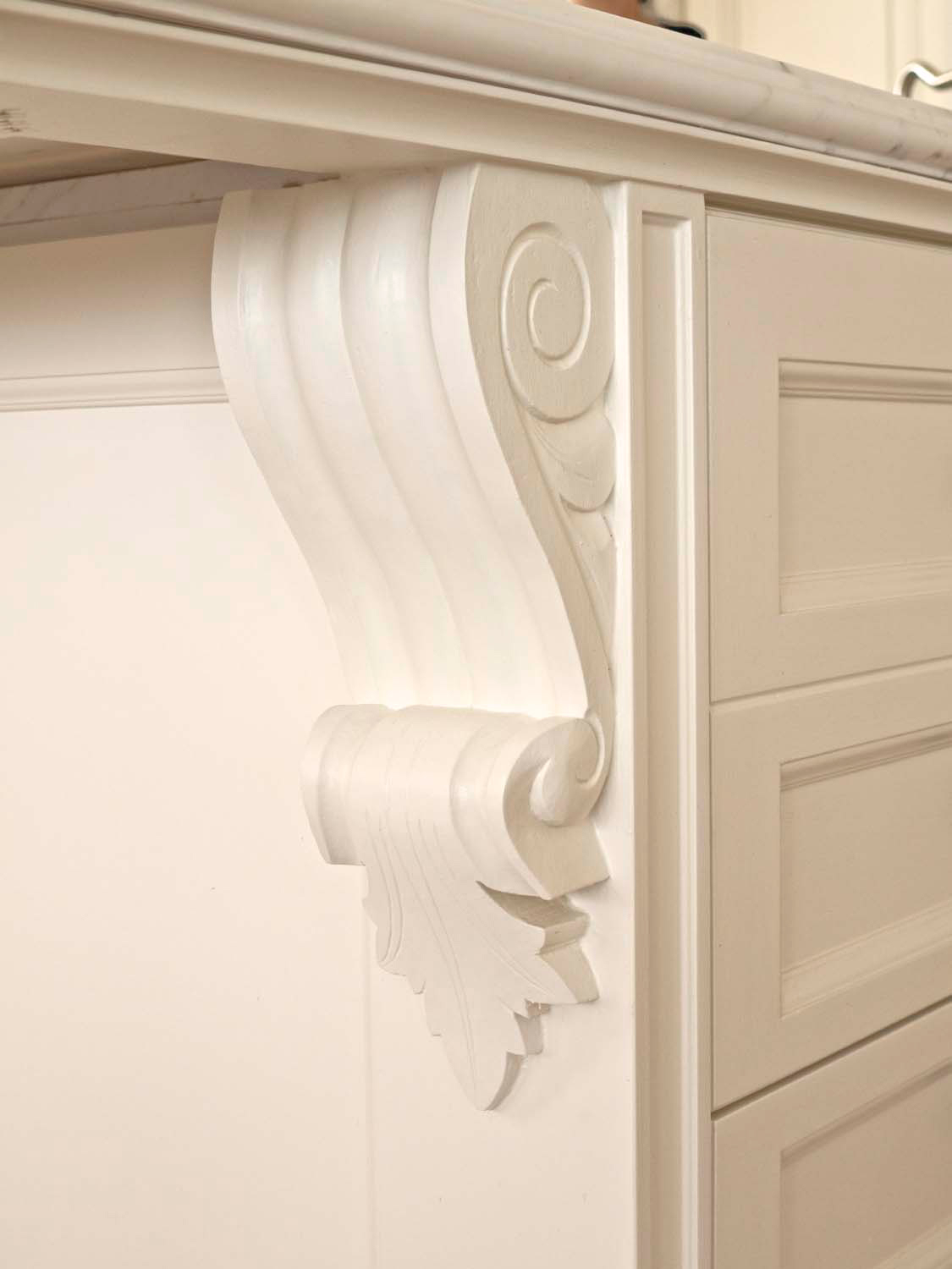 6 Close up of kitchen island carving, kithcen in painted white for modern french look