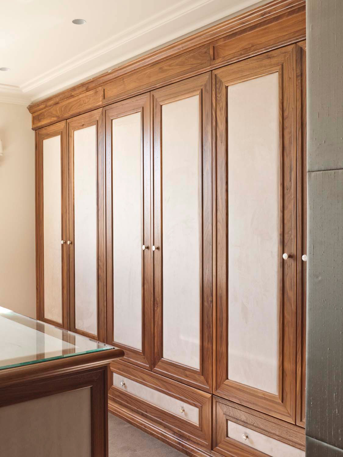 6 Custom designed wardrobe with timber bordered doors and drawers