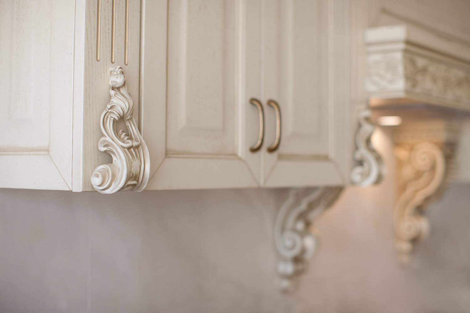 6-French-kitchen-carving-detail-on-cupboards-in-antique-white-painted-finish-