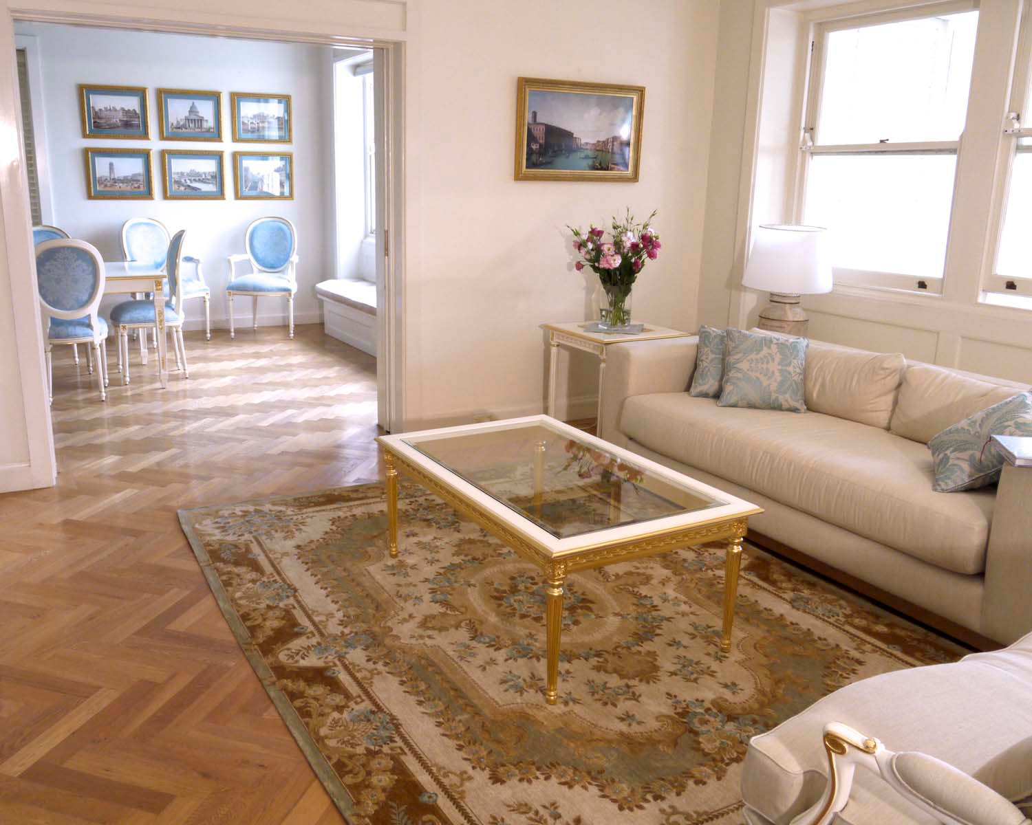 7 A parisian style interior designed lounge room with coffee table and rug