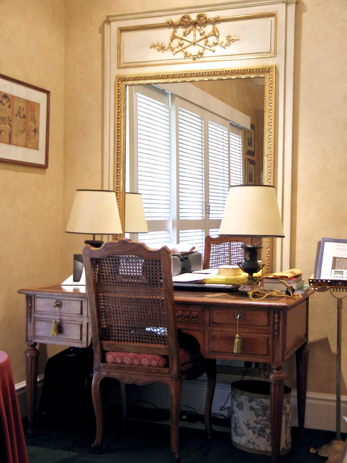 7 French study interior with desk, chair and table lamps with french mirror and art