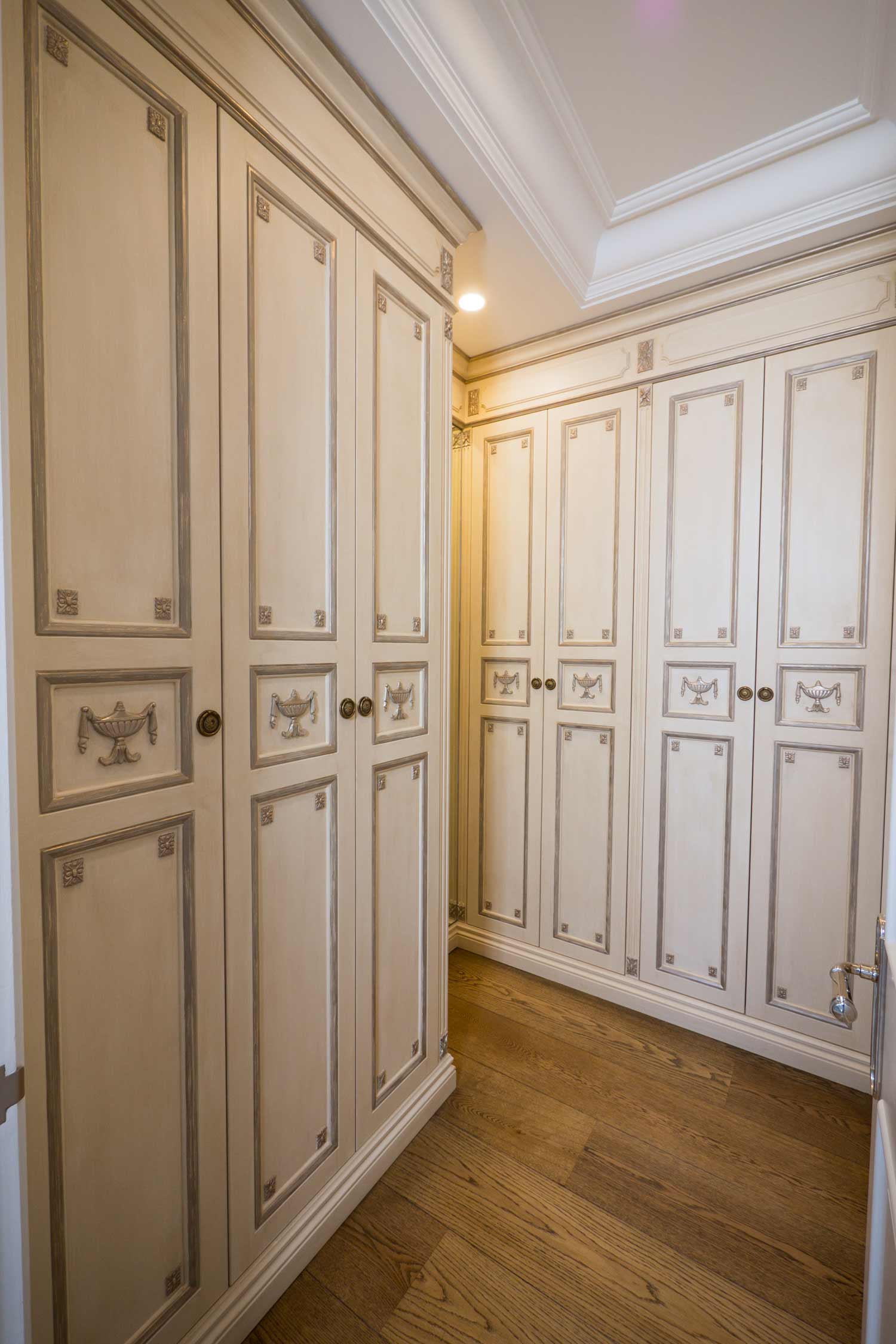 7 French walk in wardrobe in antique white finish and french ornaments
