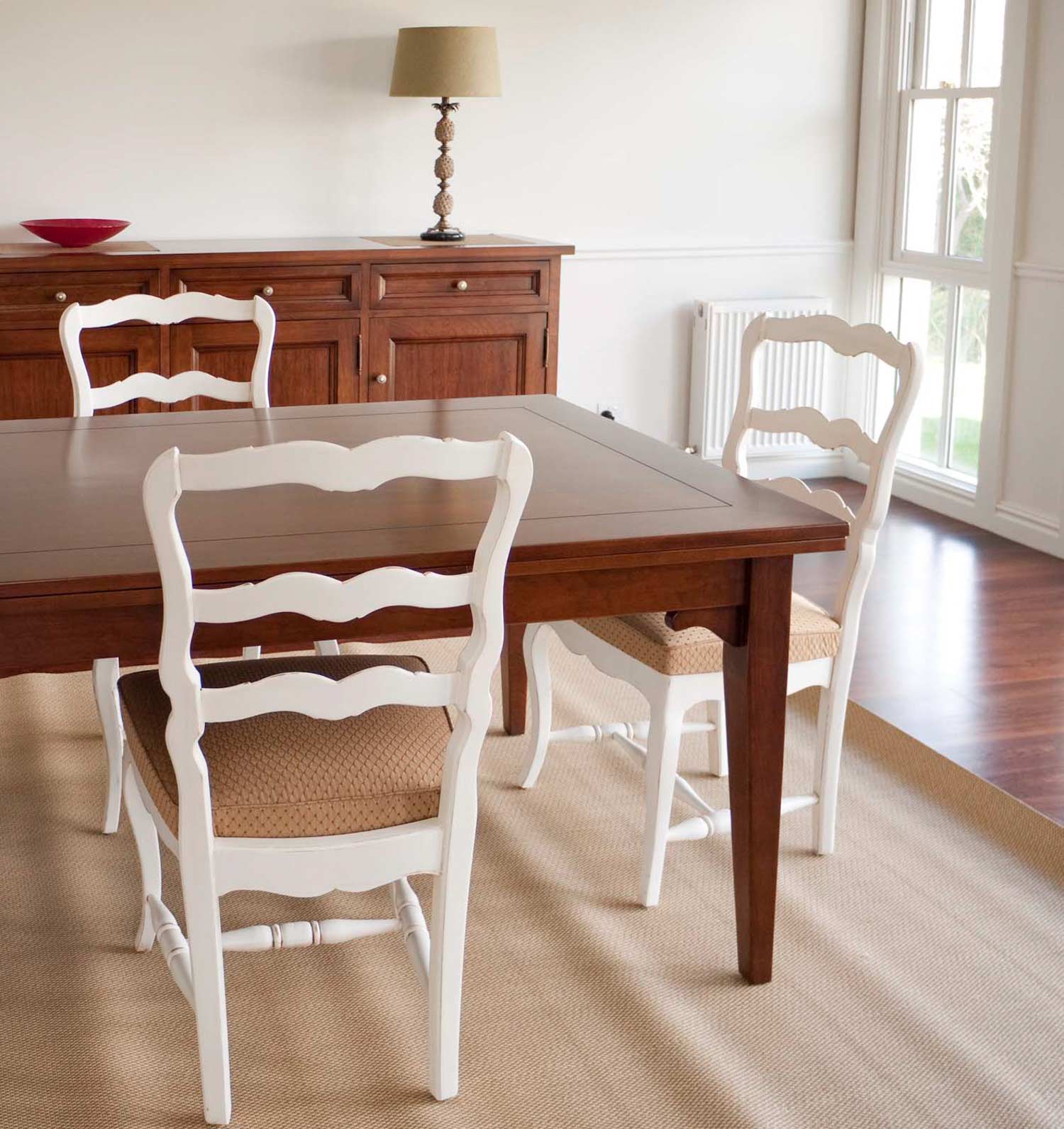 9 French dining room with timber table and white chairs