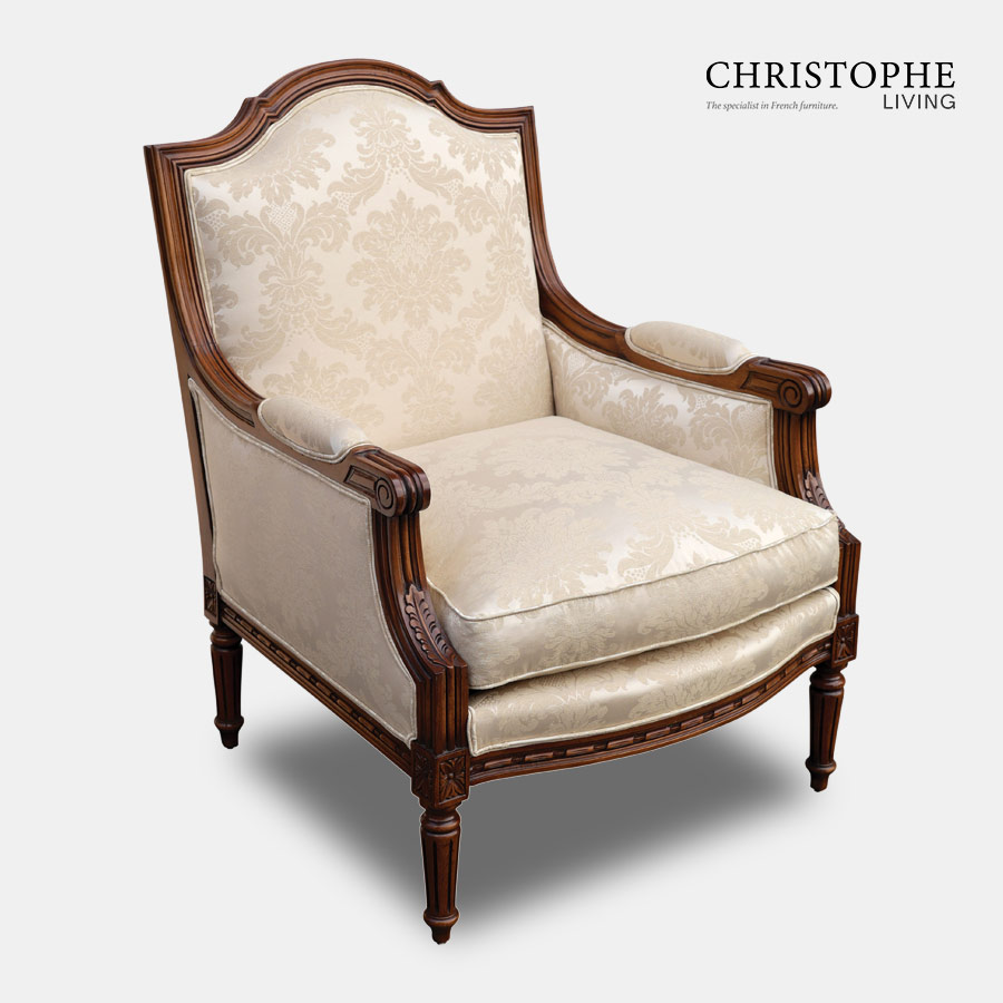 French carved walnut Louis style timber French armchair with satin cream damask fabric and French style legs.