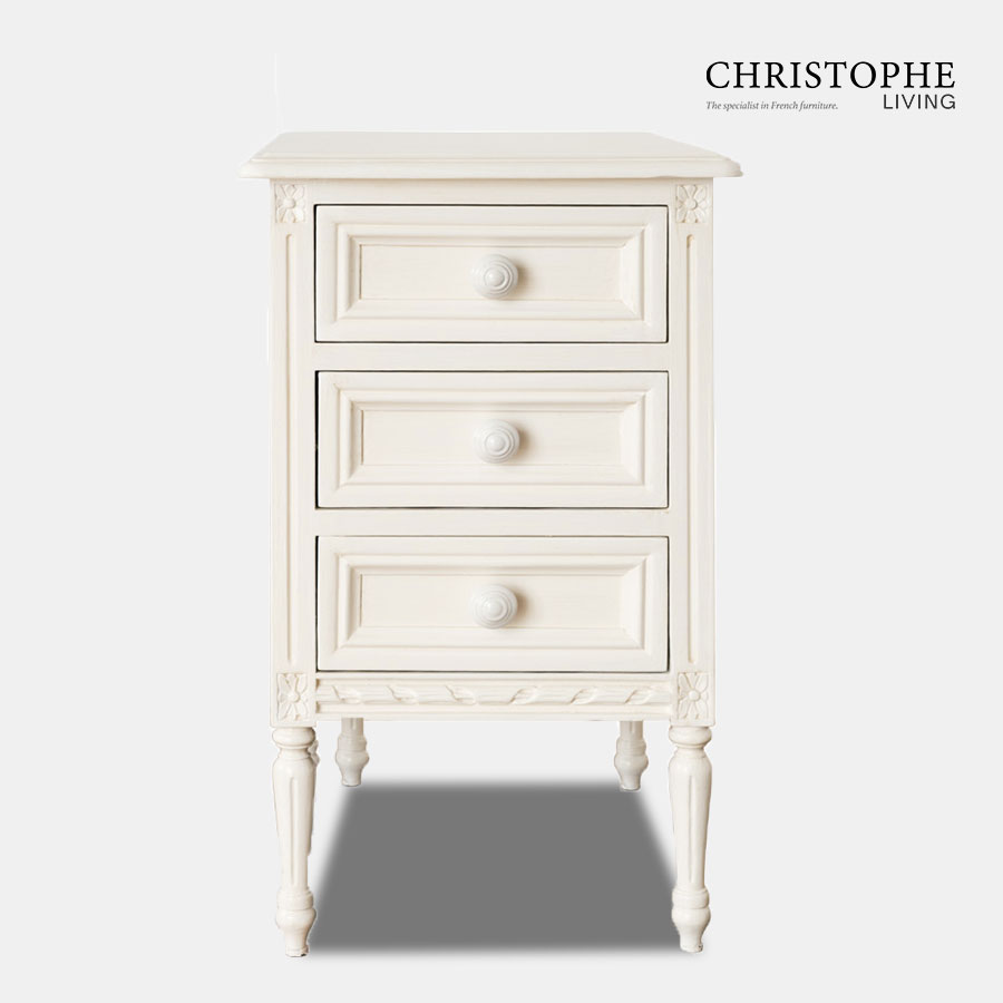 French reproduction bedside table in antique white with tapered Louis XVI legs and carving details