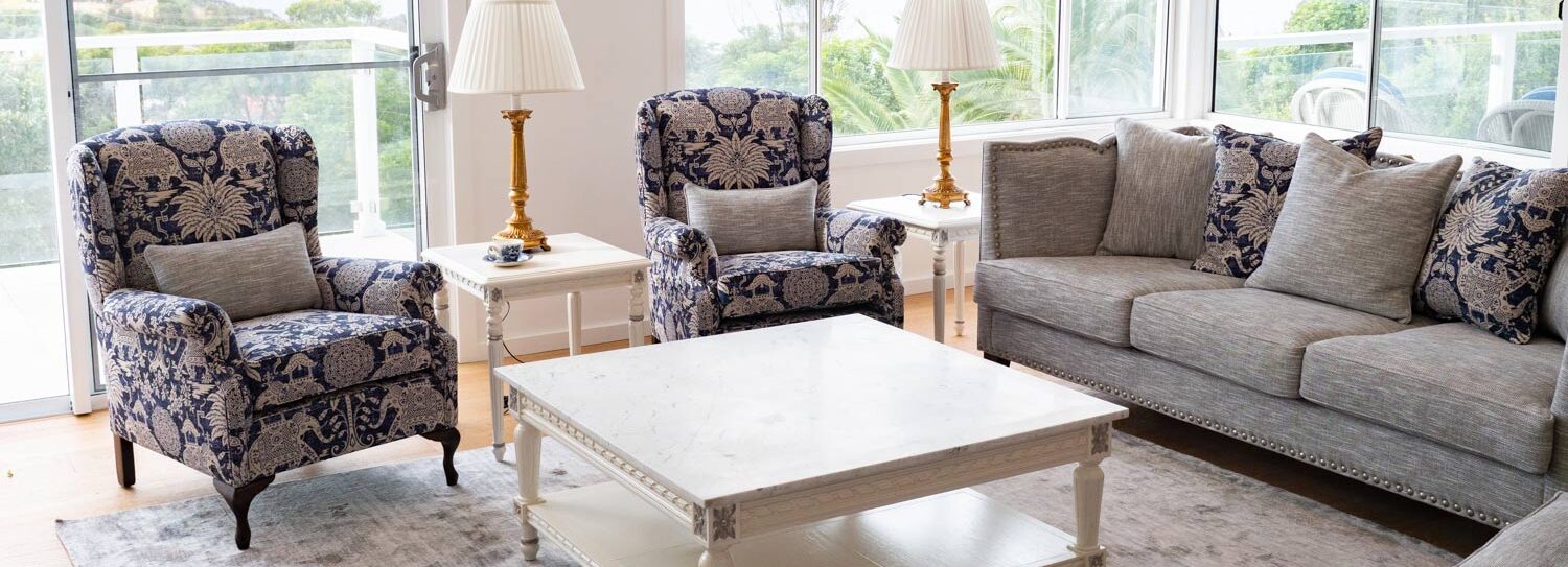 hamptons interior sofa with armchairs and coffee table