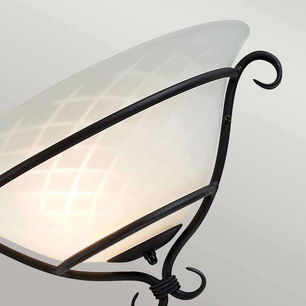 Hollowmere Flame Scroll Wall Uplighter in Black with Etched Opal Glass Hollowmere Flame Scroll Wall Uplighter in Black with Etched Opal Glass — detail view