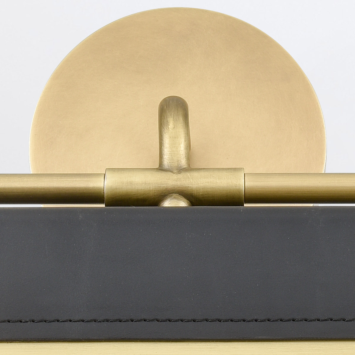 Kirrawee Gate Retro Modern Wall Light in Vintage Brass and Tuxedo Leather — detail view