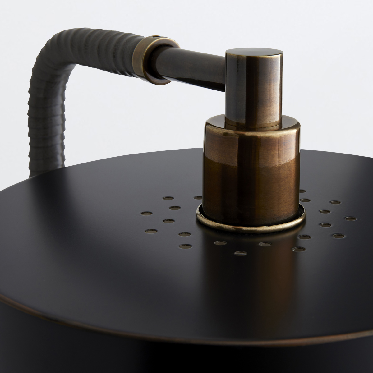 Larchbrook Retro Modern Wall Light in Heritage Brass and Black Larchbrook Retro Modern Wall Light in Heritage Brass and Black — detail view