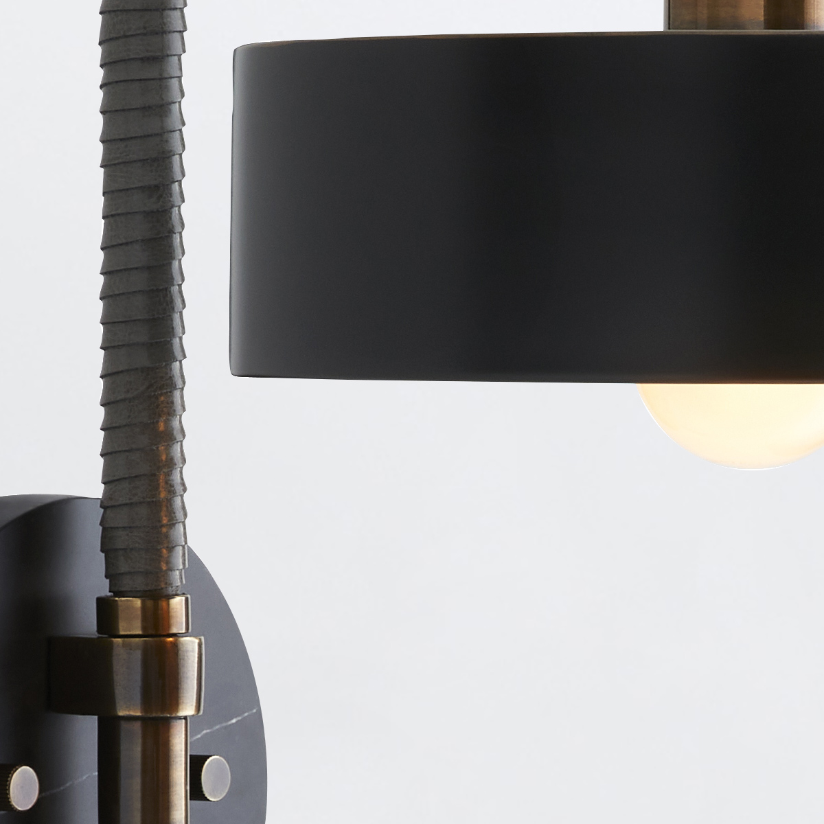 Larchbrook Retro Modern Wall Light in Heritage Brass and Black Larchbrook Retro Modern Wall Light in Heritage Brass and Black — detail view