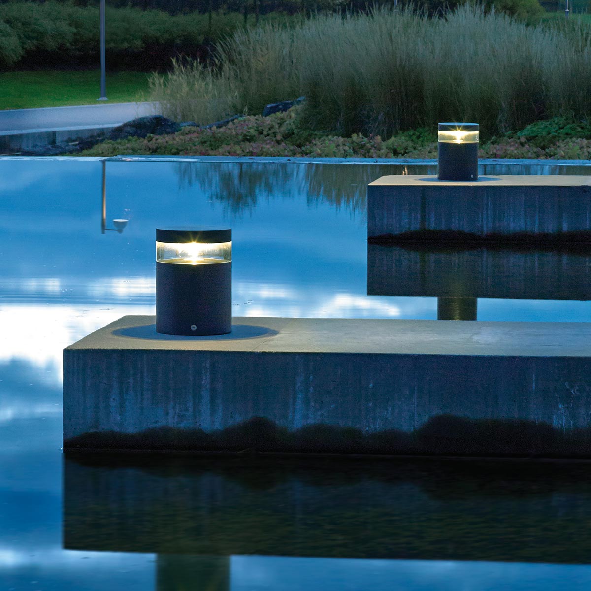 Nordholme Bollard Modern Graphite Outdoor Bollard Light Nordholme Bollard Modern Graphite Outdoor Bollard Light — in situ view