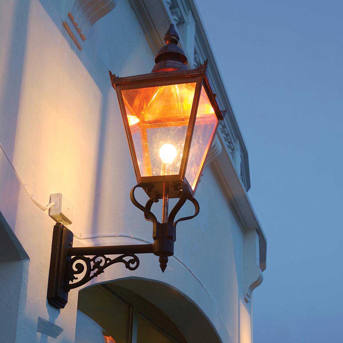 Riverbank Quarter Traditional Outdoor Wall Lantern in Copper Riverbank Quarter Traditional Outdoor Wall Lantern in Copper — in situ view